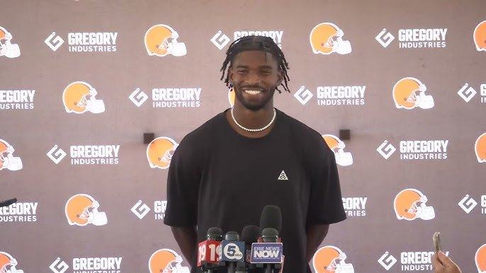 Shedeur Sanders speaking to reporters in April
